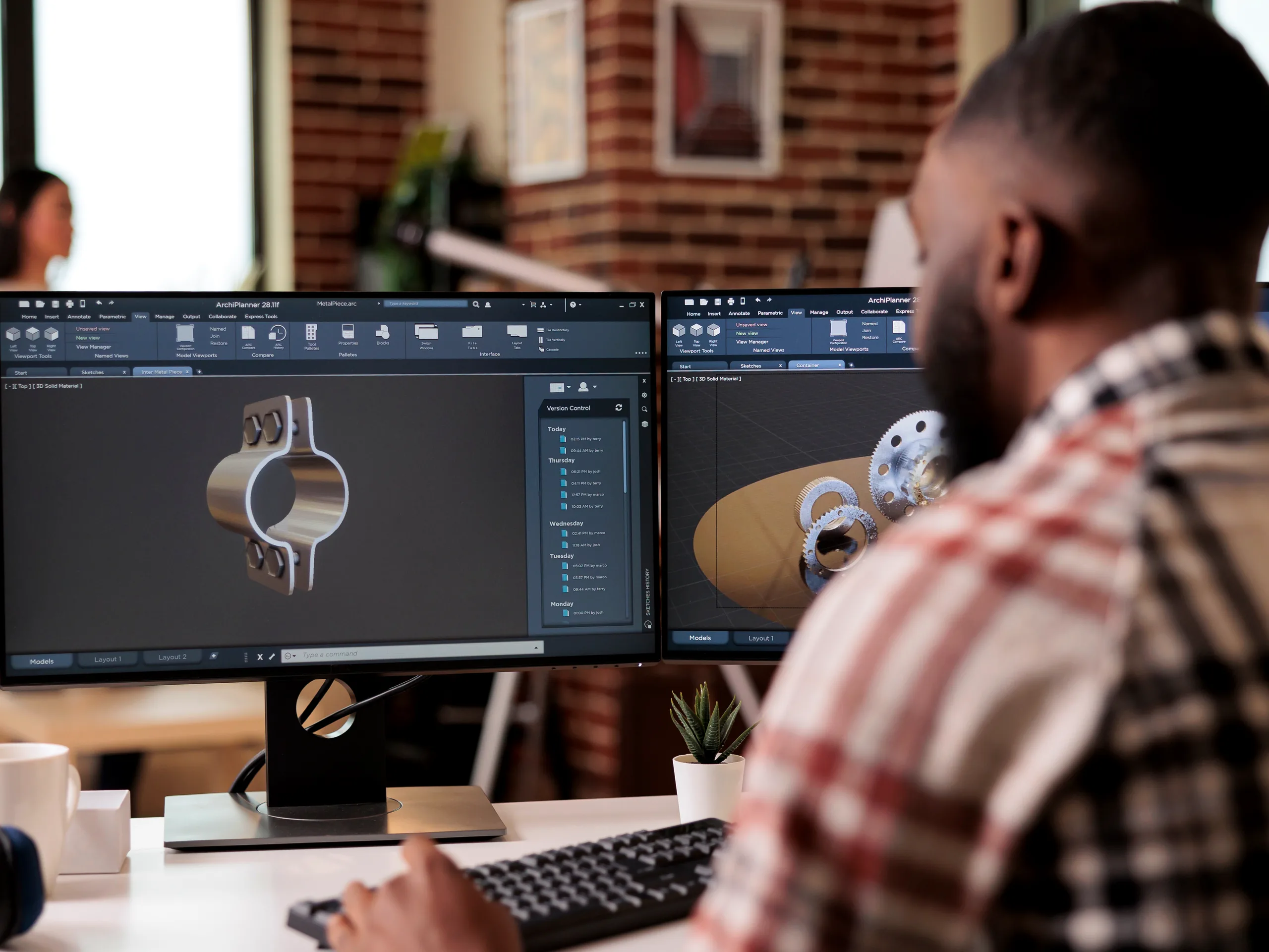 An engineer working a 3D model into production drawings