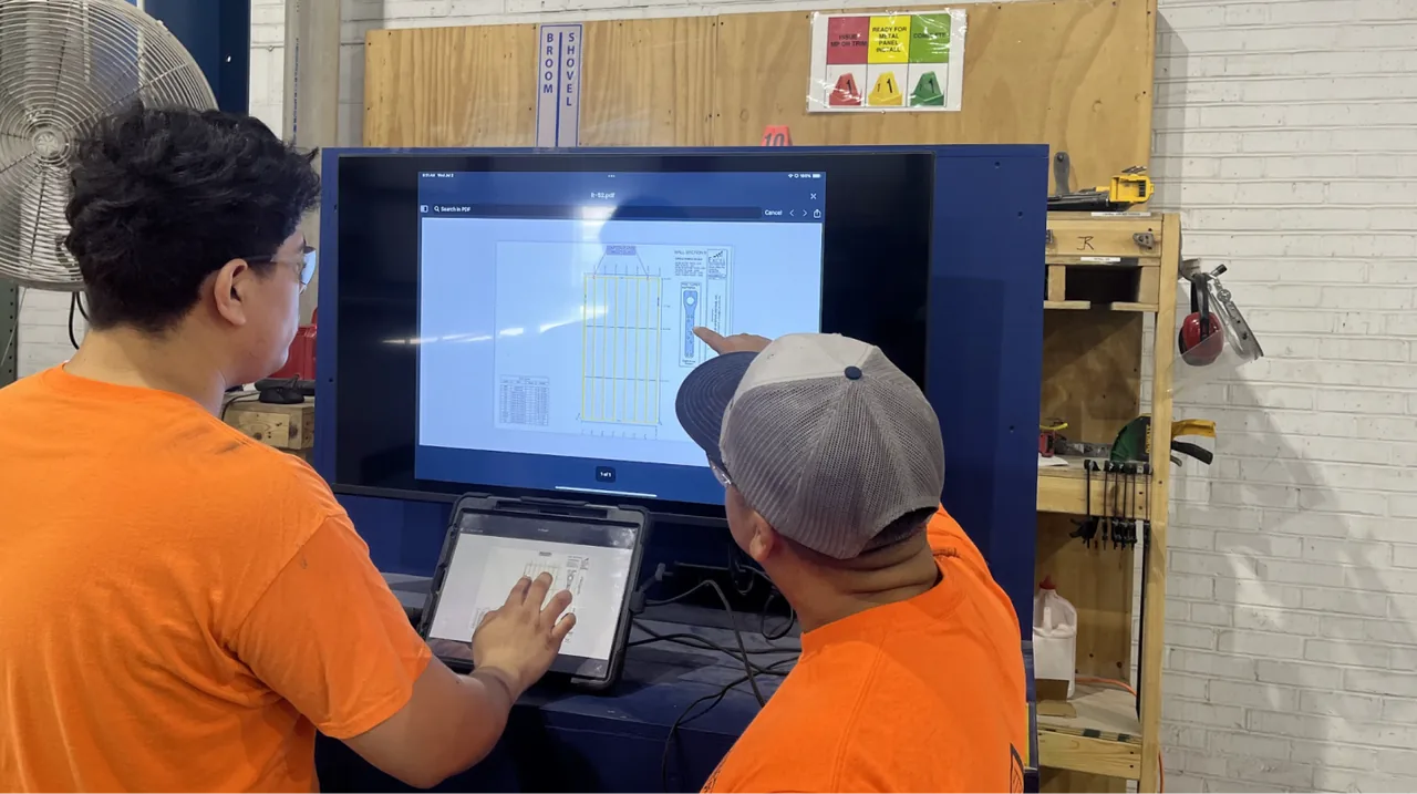 A wall panel production line with sub-assemblies in progress